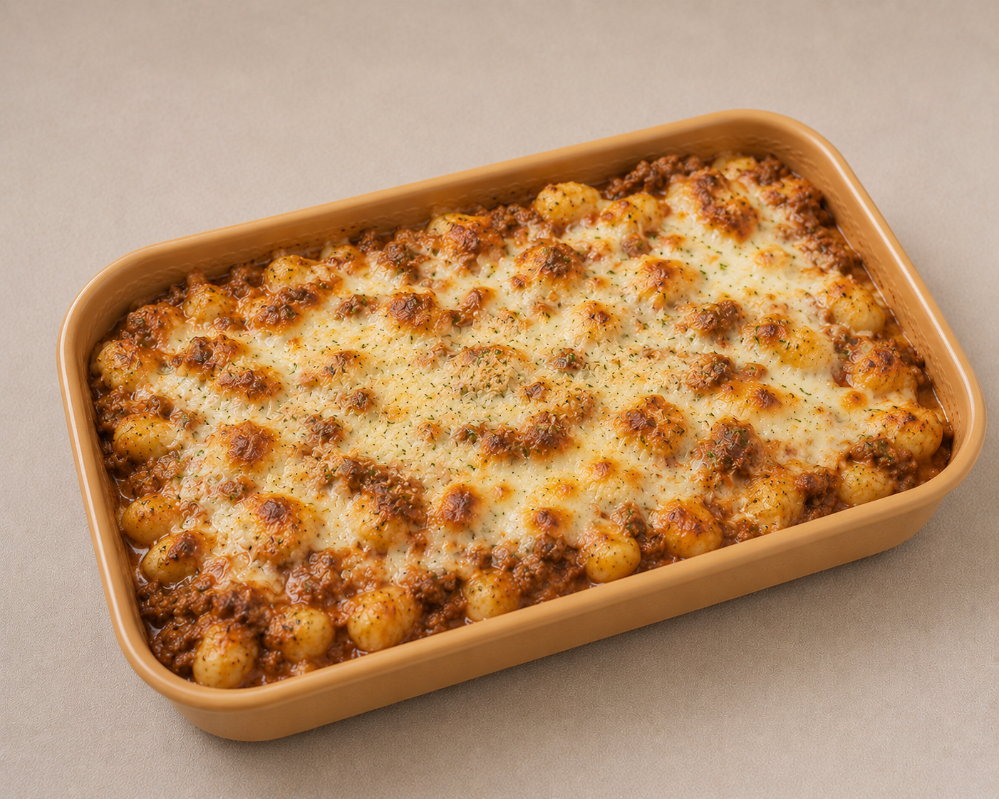 Gratin de ñoquis con salsa boloñesa